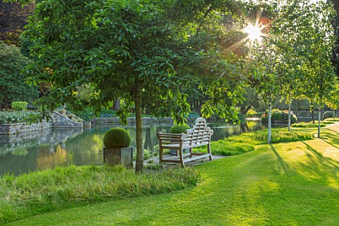ABLINGTON_MANOR_GLOUCESTERSHIRE_LAWN_WOODEN_BENCH_SEAT_SEATING_COLN_RIVER_IN_SUMMER_WATER