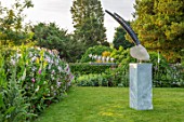 ASTHALL MANOR, OXFORDSHIRE: LAWN, ROSES, SCULPTURE REACHING BY VANESSA PASCHAKARNIS. HEDGE, HEDGES, HEDGING, ENGLISH, COUNTRY, GARDEN
