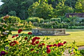 THE WALLED GARDEN AT COWDRAY, WEST SUSSEX: RED ROSES, LAWN, RAISED POND, POOL, WATER, FEATURE, SUMMER, BORDERS