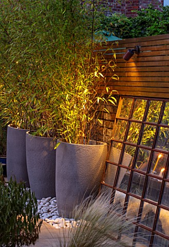 TANYA_SOUTHWORTH_GARDEN_LONDON_DESIGNER_ANOUSHKA_FEILER_ANTIQUE_MIRROR_CONTAINERS_WITH_BAMBOO_SMALL_
