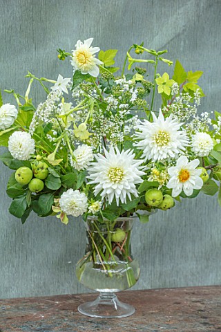 CLAUS_DALBY_GARDEN_DENMARK_FLOWER_BOUQUET_IN_WHITE_AND_GREEN_BY_CLAUS_DALBY_IN_GREY_CONTAINER_DAHLIA