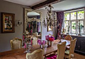 PYTTS HOUSE, OXFORDSHIRE: THE DINING ROOM. DINING TABLE, CHAIRS, CANDELABRAS, MIRROR
