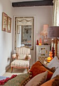 PYTTS HOUSE, OXFORDSHIRE: CLASSIC BEDROOM, GOLD, BURNT ORANGE: BED, MIRROR, CHAIR, CHRISTMAS