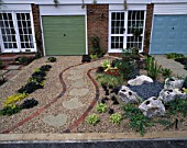 JAPANESE STYLE FRONT GARDEN BY JANE FEARNLEY-WHITTINGSTALL WITH PURPLE AND GOLD LEAVED PLANTING