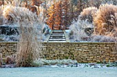 THE OLD RECTORY, QUINTON, NORTHAMPTONSHIRE: DESIGNER ANOUSHKA FEILER: WALL, LAWN, RILL, FROST, WINTER, FROSTY GARDEN, ENGLISH, COUNTRY, GRASSES, HEDGES, WATER