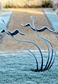 THE OLD RECTORY, QUINTON, NORTHAMPTONSHIRE: DESIGNER ANOUSHKA FEILER: METAL BIRD SCULPTURE ON LAWN, ORNAMENT, WINTER, FROST