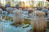 THE OLD RECTORY, QUINTON, NORTHAMPTONSHIRE: DESIGNER ANOUSHKA FEILER: WALL, LAWN, FROST, WINTER, FROSTY GARDEN, ENGLISH, COUNTRY, GRASSES, HEDGES