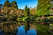 LITTLE MALVERN COURT, WORCESTERSHIRE: REFLECTIONS IN THE LAKE. SPRING