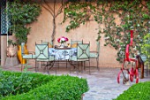 TAROUDANT, MOROCCO: DESIGNERS ARNAUD MAURIERES AND ERIC OSSART: TERRACE, PATIO, WALL, SEATS, TABLE, PLACE TO SIT, ENTERTAINING