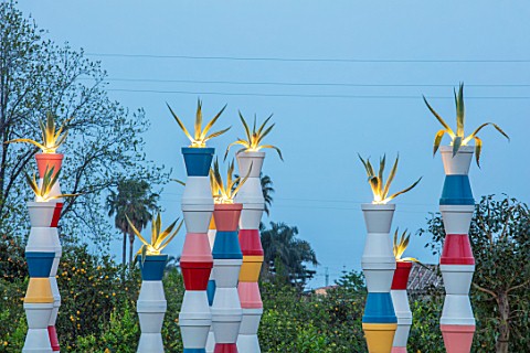 RADICEPURA_GARDEN_FESTIVAL_SICILY_ITALY_THE_BABYLONIAN_CRADLE_GARDEN_COLOURFUL_TOWERS_TOPPED_WITH_AG