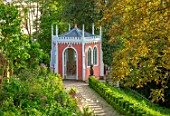 PAINSWICK ROCOCO GARDEN, GLOUCESTERSHIRE: ART UNBOUND: GRASS SLOPE, EAGLE HOUSE. FOLLY, FOLLIES, SUMMERHOUSE, PAINTED, BUILDING, MAIA BY ALY BROWN, SCULPTURE