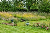 ROOKERY FARM, SURREY: LAWN, CONTAINERS, URNS, STEPS, WILDFLOWER MEADOW, ROSES, GARDENS, ENGLISH, COUNTRY, SUMMER. ROSA BOSCOBEL, AUSCOUSIN
