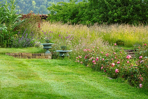 ROOKERY_FARM_SURREY_LAWN_CONTAINERS_URNS_MEADOW_ROSES_WILDFLOWERS_STONE_STEPS_GARDENS_ENGLISH_COUNTR