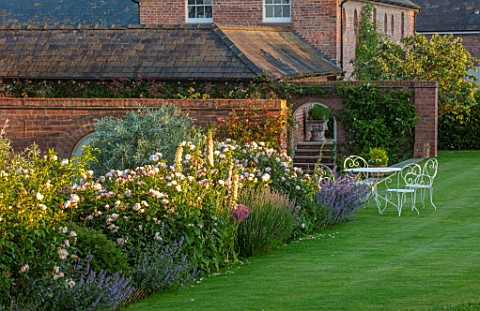MANOR_FARM_CHESHIRE_LAWN_BORDERS_METAL_TABLE_AND_CHAIRS_UPPER_LAWN_ROSA_PERLE_DAZURE_FOXGLOVES_PYRUS