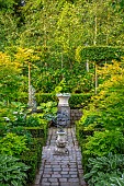 CLAUS DALBY GARDEN, DENMARK: VIEW ALONG PATH, TERRACE, FOLIAGE, LEAVES, GREEN, HOSTAS IN CONTAINERS, ACER SHIRASAWANUM, SHRUB, FULLMOON MAPLE
