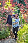 BATTS COTTAGE, OXFORDSHIRE: OWNERS OLIVIA AND TIM PAYNE IN THEIR GARDEN