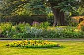 CANONS ASHBY, NORTHAMPTONSHIRE, THE NATIONAL TRUST - LAWN, BEDDING,  CEDAR OF LEBANON, FORMAL, PARK, JULY, BORDERS