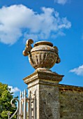 CANONS ASHBY, NORTHAMPTONSHIRE, THE NATIONAL TRUST: GATE WITH STONE URN ON TOP