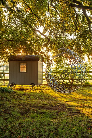 MITTON_MANOR_STAFFORDSHIRE_PATH_GATE_TREE_SHEDS_SUMMERHOUSE_OFFICE_LAWN_SUNRISE_COUNTRY_GARDEN_ENGLI