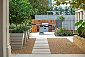DESIGNER ANTHONY PAUL: SMALL, TOWN, FORMAL, GRAVEL, PATH, STONE, SLABS, PAVING, BARBEQUES, BARBECUES,CONTAINERS, LONDON, AL FRESCO, PATIO