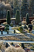 DRUMMOND CASTLE GARDENS, SCOTLAND: LAWN, FROST, FROSTY, CASTLES, CLIPPED, TOPIARY, SHAPES, YEW, GARDENS, SCOTTISH, WINTER, HEDGES, HEDGING, SUNRISE, PARTERRES