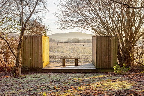 BRYANS_GROUND_HEREFORDSHIRE_THE_LIGHTBOX_CRICKET_WOOD_WINTER_WOODLAND_WOODEN_BENCH_SEAT_COUNTRY_GARD