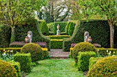 THE LASKETT GARDENS, HEREFORDSHIRE. DESIGNER ROY STRONG - LAWN, PATHS, CLIPPED TOPIARY, HEDGES, HEDGING, FOCAL POINT,GREEN