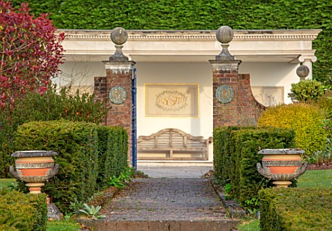 THE_LASKETT_GARDENS_HEREFORDSHIRE_DESIGNER_ROY_STRONG__VIEW_ALONG_PATH_TO_THE_COLONNADE_COURT_FORMAL
