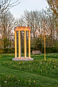 MORTON HALL GARDENS, WORCESTERSHIRE: THE MEADOW, PARK, SPRING, APRIL, MONOPTEROS, FOLLY, FOLLIES, SUNSET