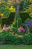 FONTHILL HOUSE GARDENS: SPRING, MAY, ENGLISH, COUNTRY, GARDENS, LAWN, BORDERS WITH ALLIUM PURPLE SENSATION, BULBS, YEW HEDGES, HEDGING