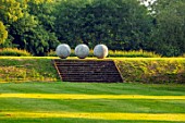 NEVILL HOLT, LEICESTERSHIRE: LAWN, STEPS, IN MIND OF MONK SCULPTURE BY PETER RANDALL PAGE