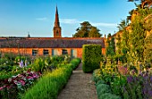 NEVILL HOLT, LEICESTERSHIRE: THE WALLED VEGETABLE GARDEN, POTAGER, PATH, LAVENDER VERA, SWEET WILLIAMS, CROCOSMIA LUCIFER, POTATOES CHARLOTTE, DELPHINIUM SUMMER SKIES
