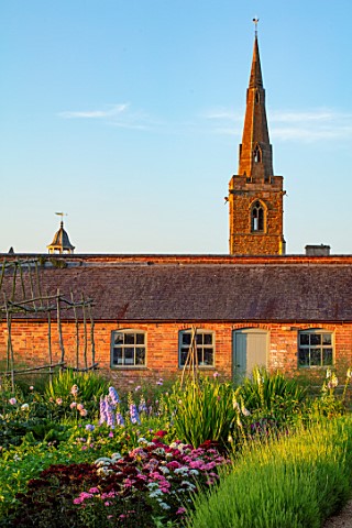 NEVILL_HOLT_LEICESTERSHIRE_THE_WALLED_VEGETABLE_GARDEN_POTAGER_PATH_LAVENDER_VERA_SWEET_WILLIAMS_CRO