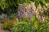 LARCH COTTAGE NURSERIES, CUMBRIA: BORDER OF PERENNIALS AND WALL, WALLS, BORDERS, SUMMER, JULY