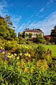 THE DOWER HOUSE, DERBYSHIRE: THE HOUSE FROM THE HOT BORDER, LAWNS, KNIPHOFIA ROOPERI, ACONITUM KELMSCOTT, AGM, DAHLIA GLORIE VAN HEEMSTEDE