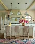 ASHBROOK HOUSE, NORTHAMPTONSHIRE: CONTEMPORARY COUNTRY HOUSE KITCHEN, DAHLIAS IN CONTAINERS