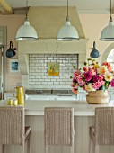 ASHBROOK HOUSE, NORTHAMPTONSHIRE: CONTEMPORARY COUNTRY HOUSE KITCHEN, DAHLIAS IN CONTAINERS