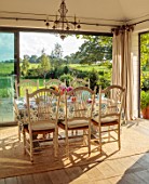 ASHBROOK HOUSE, NORTHAMPTONSHIRE: TABLE AND CHAIRS, FRENCH WINDOWS, DINING ROOM