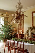MARBURY HALL, SHROPSHIRE: DESIGNER SOFIE PATON-SMITH - DINING ROOM, CHRISTMAS TREE, FIREPLACE GARLAND OF HOPS, TABLE, CHAIRS, CLOUD, DECEMBER