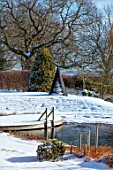 REDHILL LODGE, RUTLAND: DESIGNERS RICHARD AND SUSAN MOFFITT - NATURAL SWIMMING POOL, POND, HOUSE, SNOW, WINTER, JANUARY, WOODEN DECK, DECKING, SCULPTURE BY JAMES PARKER
